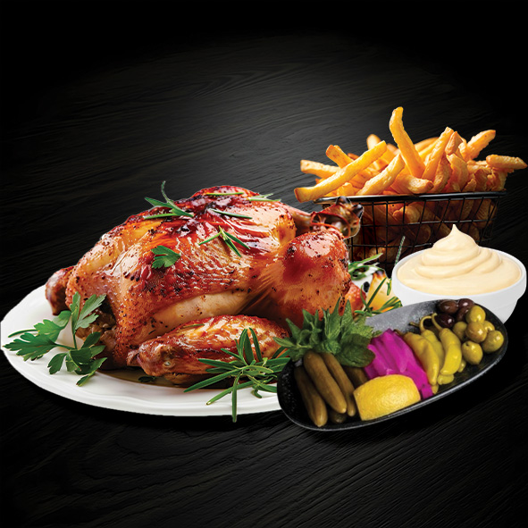 Ganzes Hähnchen mit Beilage und Pommes